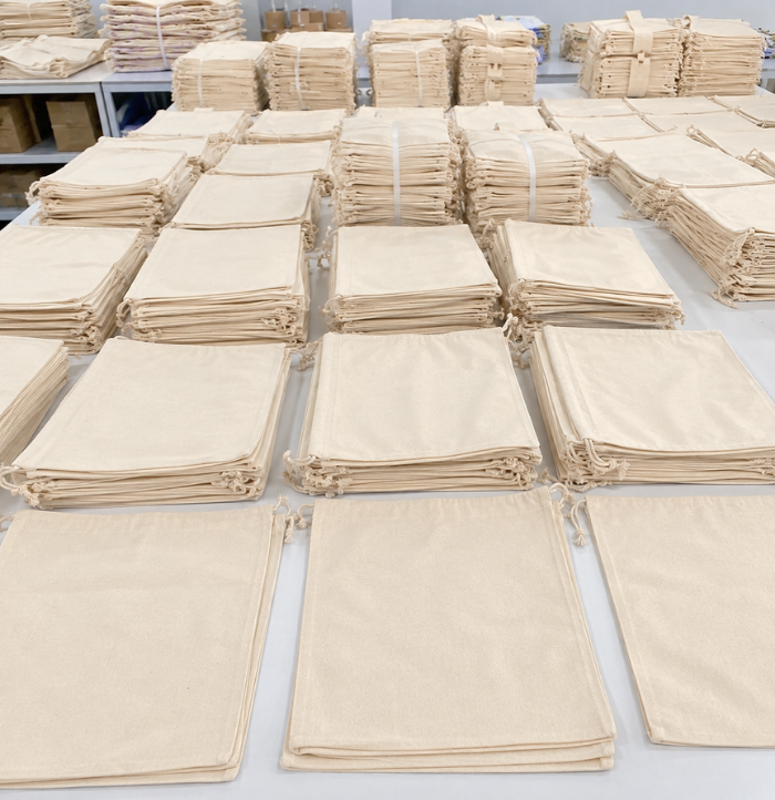 Lote de bolsas de tocuyo para pedidos mayoristas